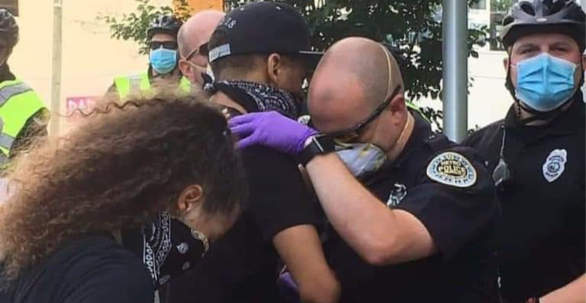 Tennessee Police Officer Prays with Protestor during Rally following the Death of George Floyd