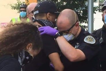 Tennessee Police Officer Prays with Protestor during Rally following the Death of George Floyd